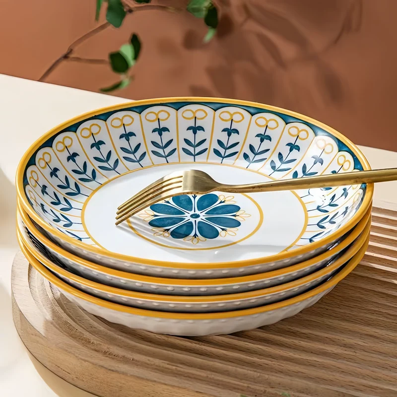 Bordenset – 4-delige porseleinen set met decoratief patroon en gouden rand